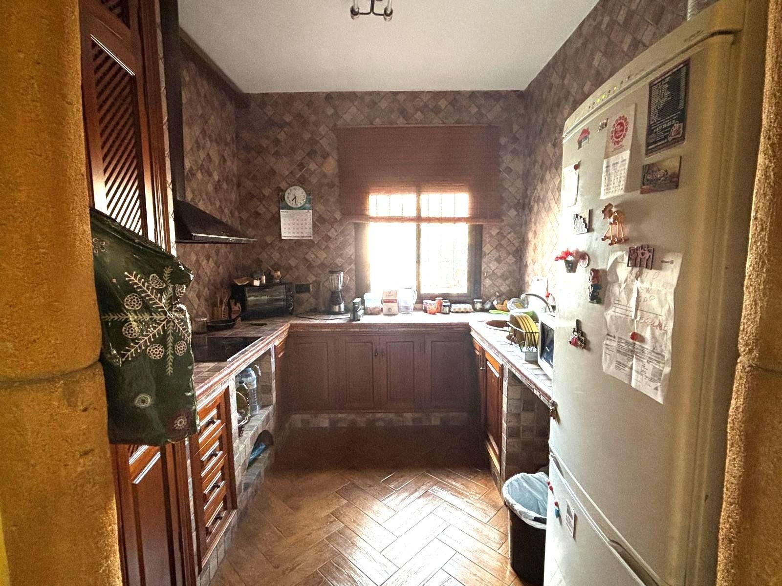 Cuina de Casa o xalet en venda en Guillena amb Aire condicionat i Terrassa