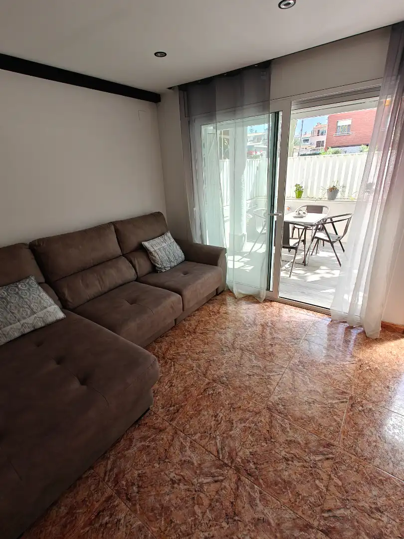 Wohnzimmer von Einfamilien-Reihenhaus zum Verkauf in Premià de Mar mit Klimaanlage, Heizung und Gemeinschaftspool