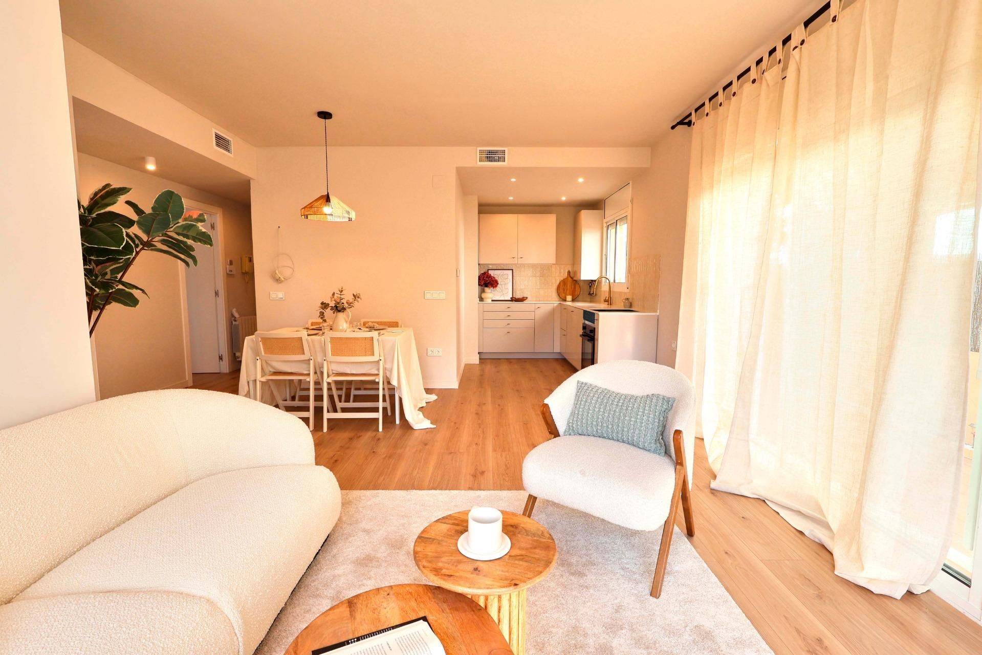 Living room of Planta baja for sale in Vilanova i la Geltrú  with Parquet flooring, Terrace and Community pool