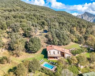 Vista exterior de Finca rústica en venda en Montagut i Oix amb Jardí privat, Terrassa i Piscina