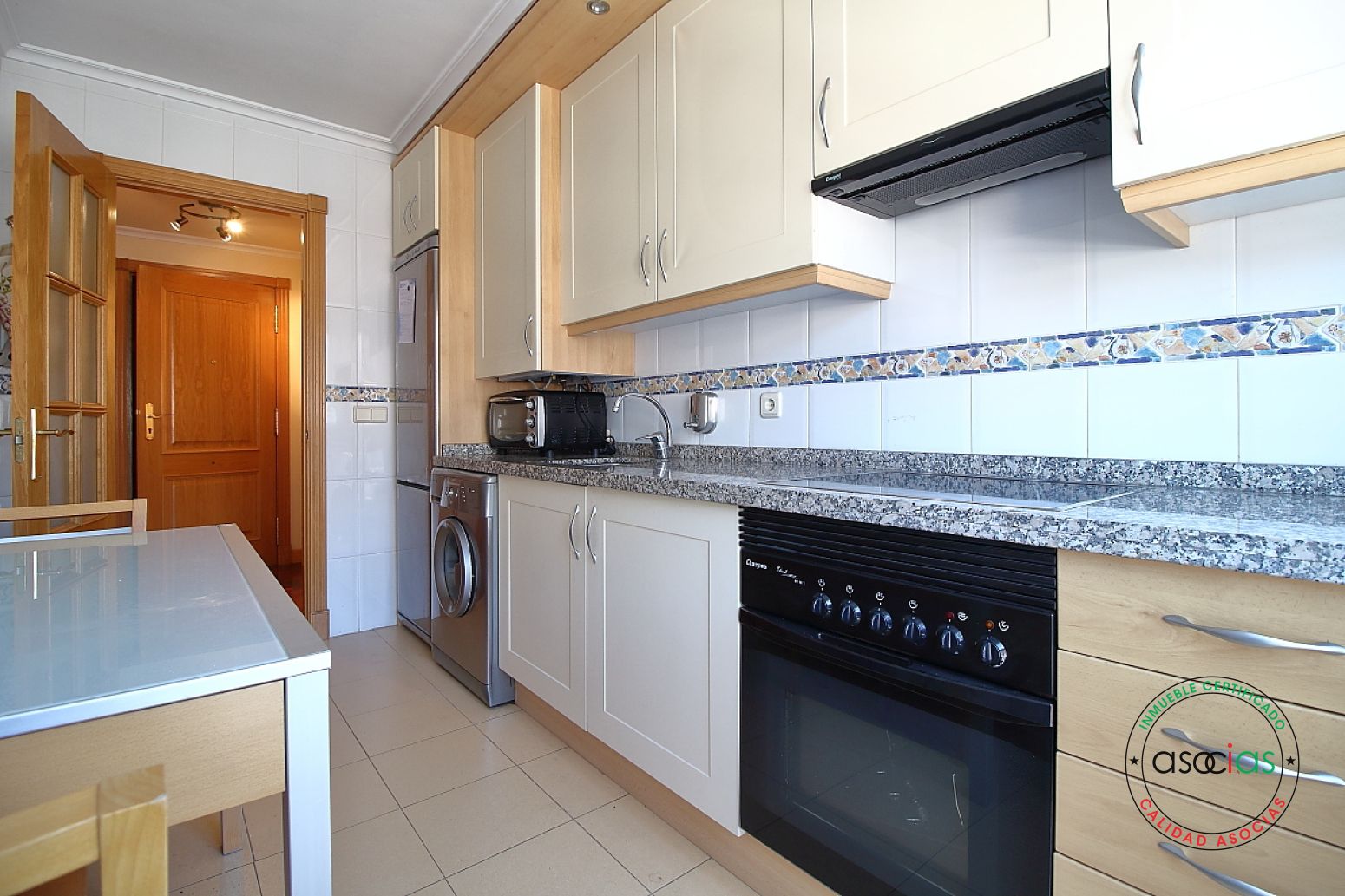 Kitchen of Flat for sale in Oviedo   with Heating, Parquet flooring and Storage room