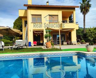 Exterior view of House or chalet for sale in Bigues i Riells  with Air Conditioner, Heating and Private garden