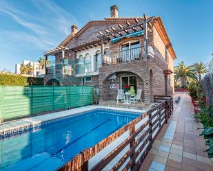 Exterior view of Single-family semi-detached for sale in Cambrils  with Air Conditioner, Swimming Pool and Balcony