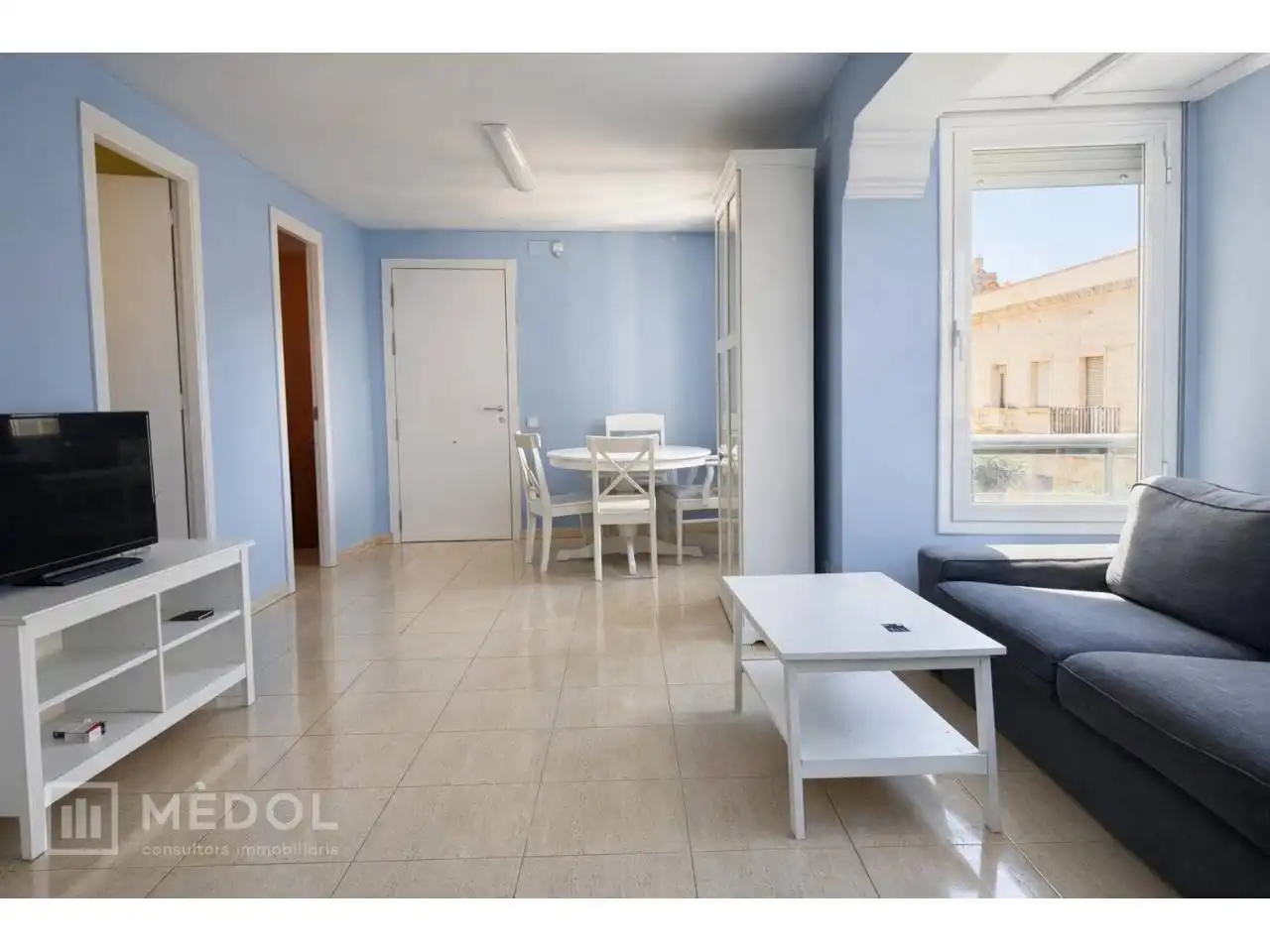 Sala d'estar de Casa o xalet en venda en Móra d'Ebre amb Aire condicionat, Parquet i Moblat