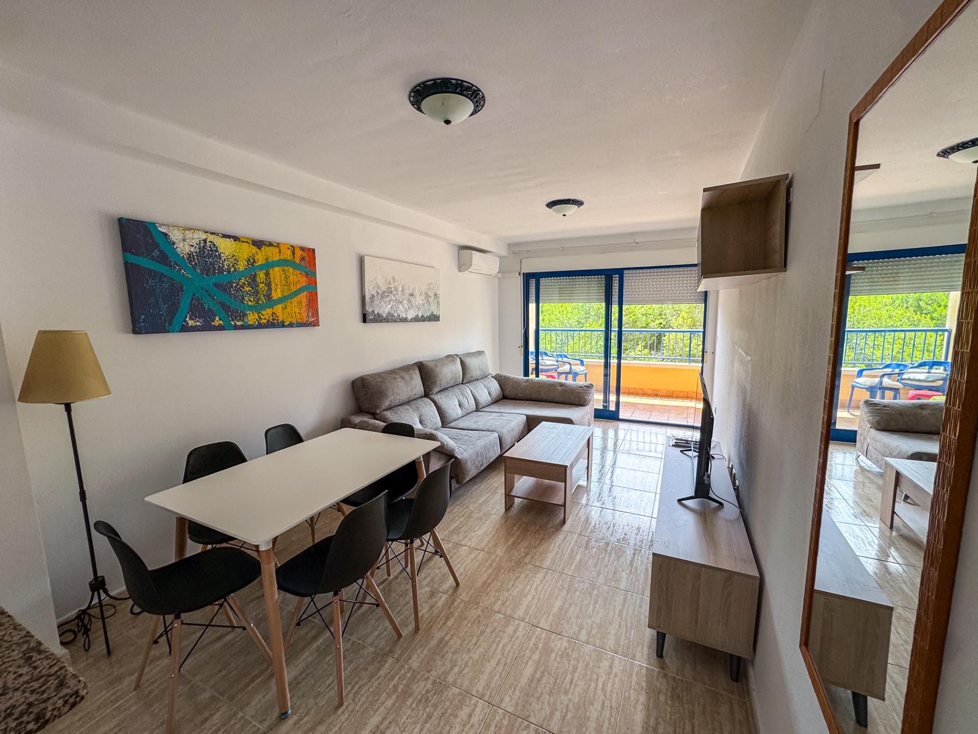 Sala d'estar de Pis en venda en Orihuela amb Aire condicionat, Jardí privat i Piscina comunitària