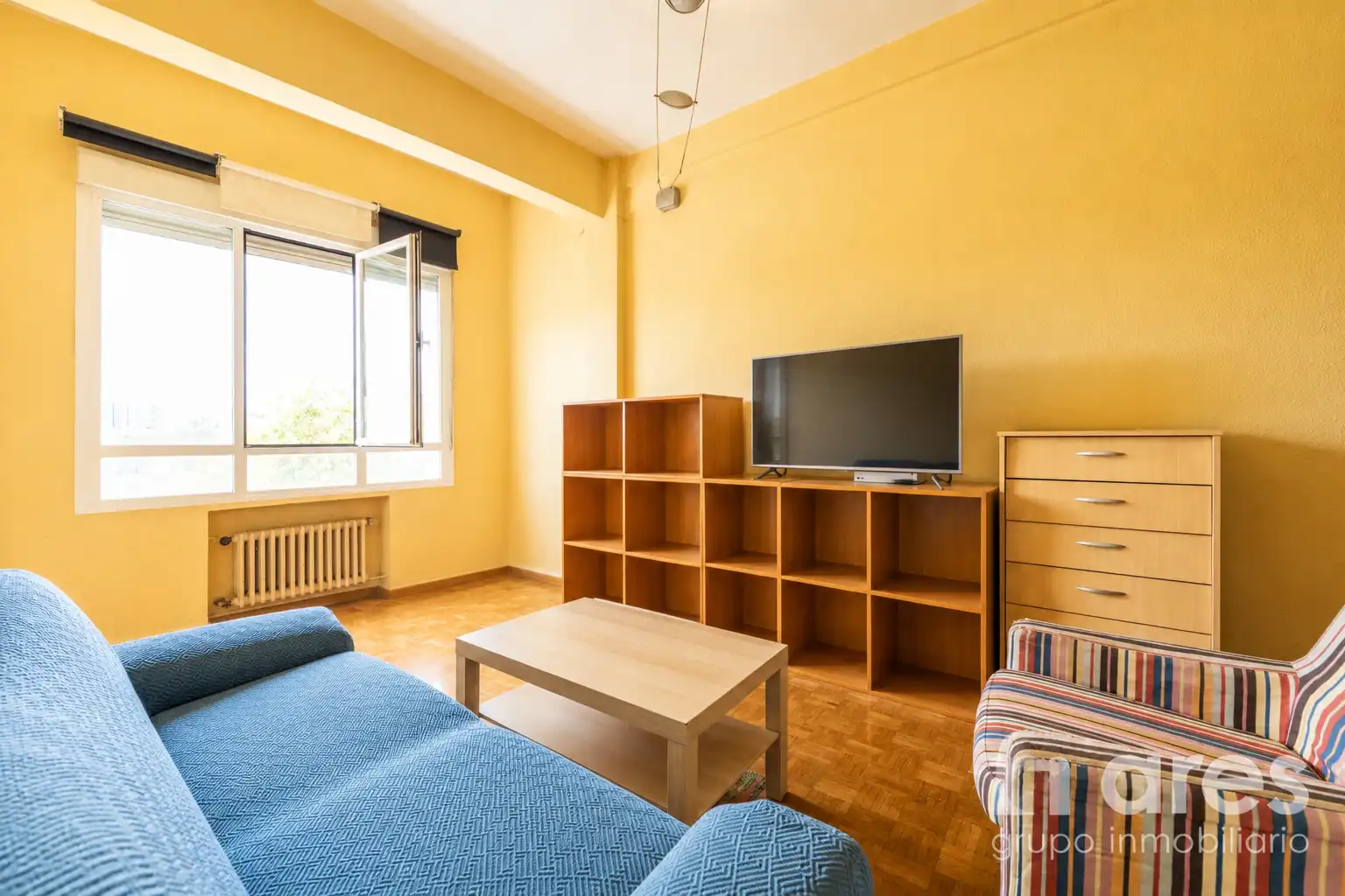 Sala de estar de Piso en venta en  Madrid Capital con Calefacción