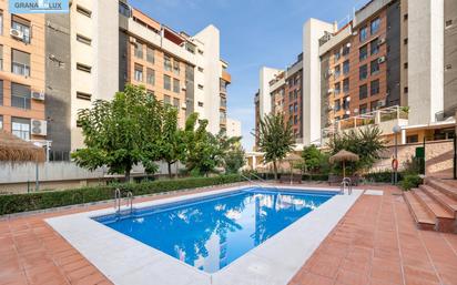 Swimming pool of Flat for sale in  Granada Capital  with Heating, Parquet flooring and Community pool