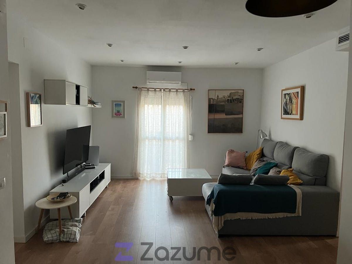 Sala d'estar de Pis de lloguer en  Sevilla Capital amb Aire condicionat, Terrassa i Moblat