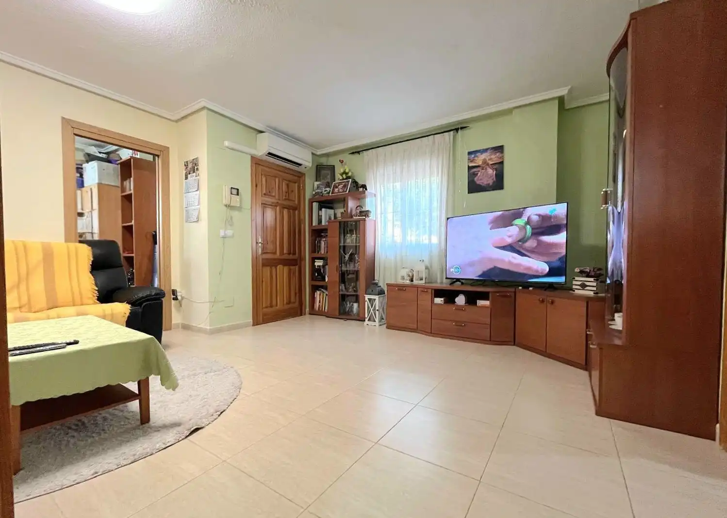 Sala de estar de Casa adosada en venta en Rojales con Aire acondicionado, Jardín privado y Terraza