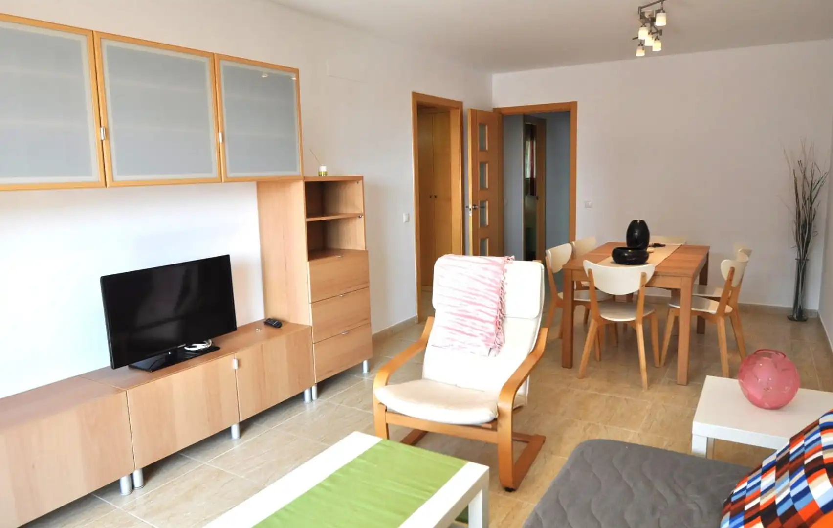 Sala de estar de Apartamento en venta en La Ràpita con Amueblado y Piscina comunitaria