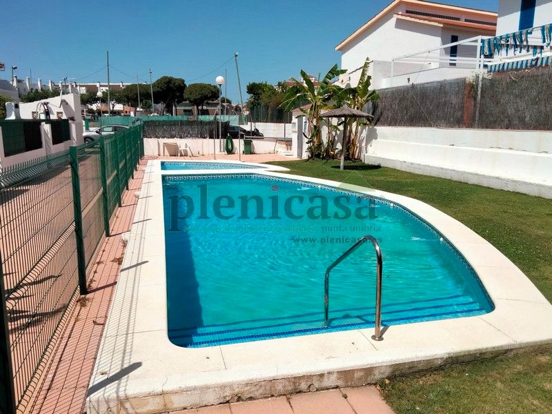 Swimming pool of Single-family semi-detached for sale in El Portil  with Private garden, Terrace and Community pool