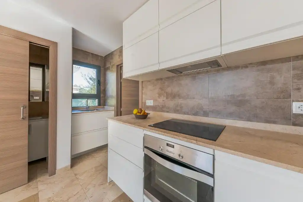 Cuina de Casa o xalet en venda en Muro amb Aire condicionat, Jardí privat i Terrassa