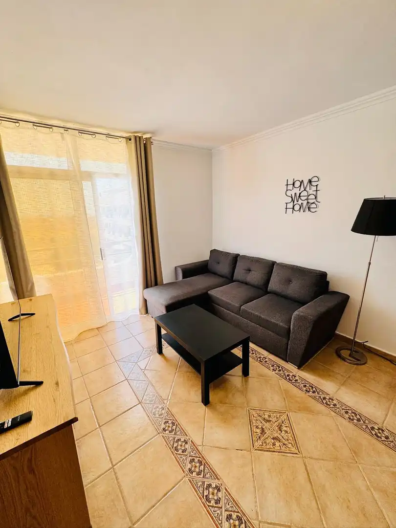Living room of Flat for sale in Adeje  with Swimming Pool, Furnished and Balcony