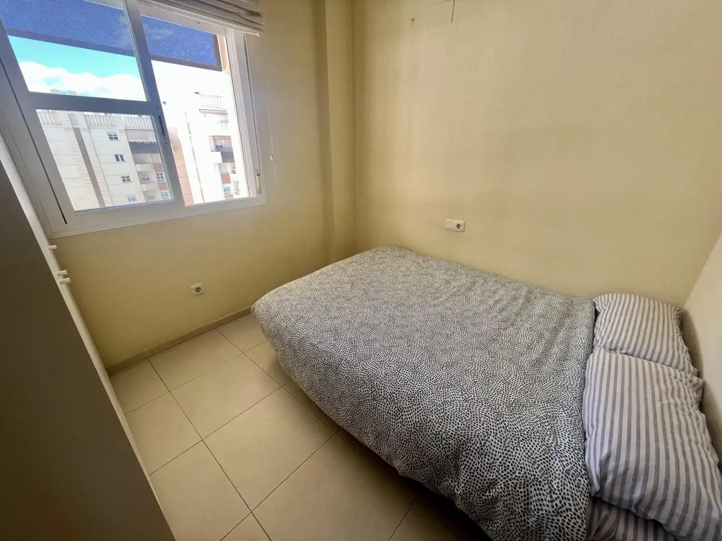 Dormitori de Pis de lloguer en Málaga amb Aire condicionat, Jardí privat i Terrassa