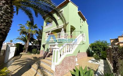 Vista exterior de Casa o xalet en venda en Oliva amb Aire condicionat, Jardí privat i Terrassa