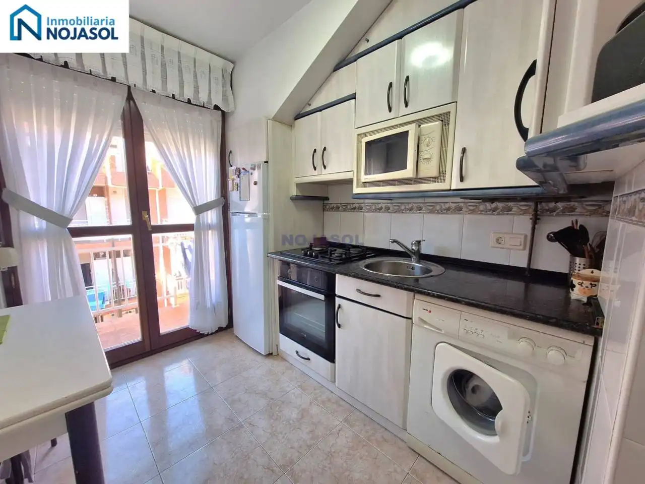 Cuina de Apartament en venda en Noja amb Calefacció, Terrassa i Moblat