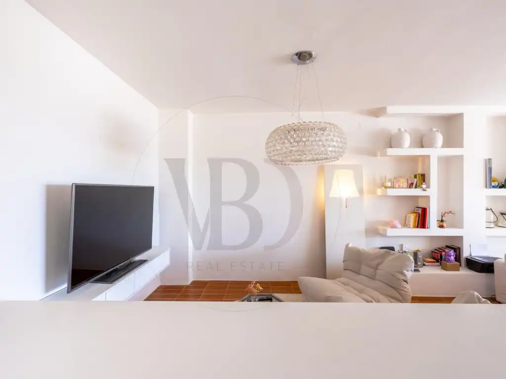 Sala d'estar de Casa adosada de lloguer en Santa Eulària des Riu amb Aire condicionat i Piscina comunitària