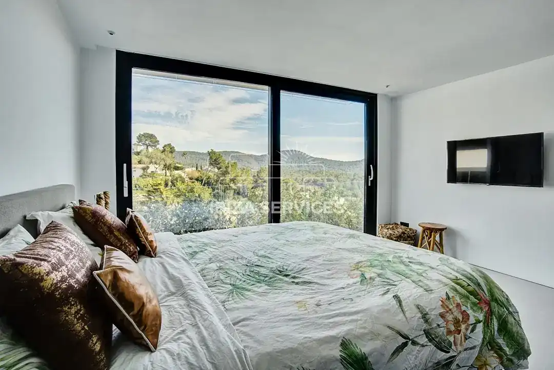 Dormitori de Casa o xalet de lloguer en Santa Eulària des Riu amb Aire condicionat, Jardí privat i Piscina