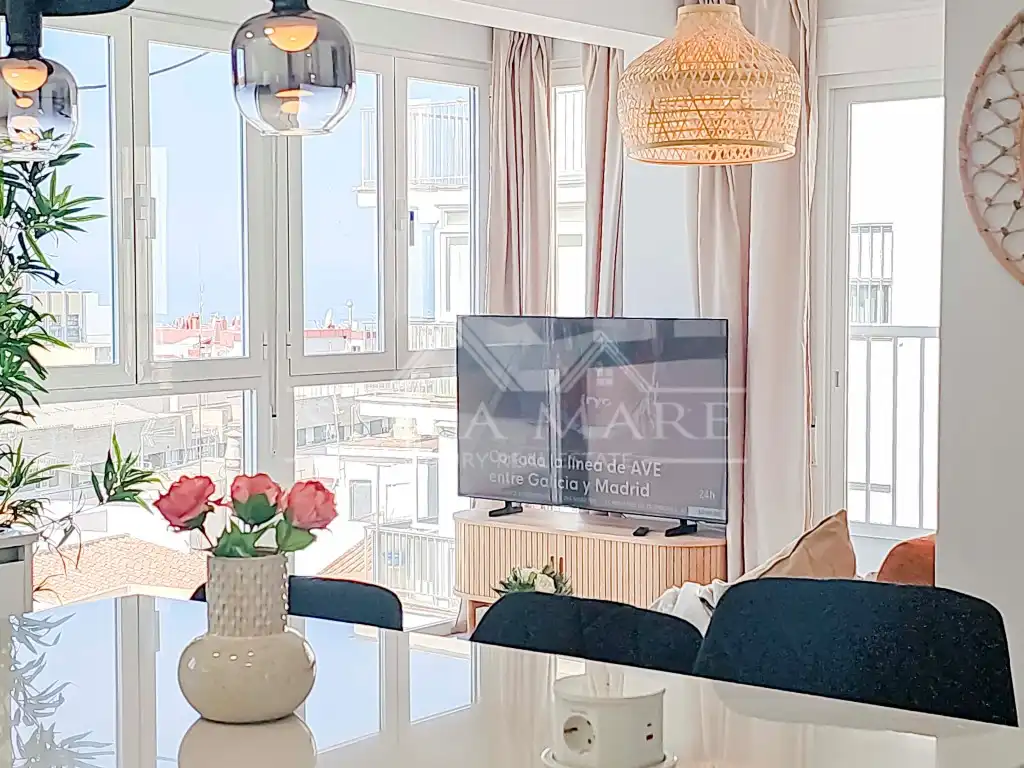 Sala d'estar de Apartament en venda en Nerja amb Aire condicionat, Terrassa i Moblat