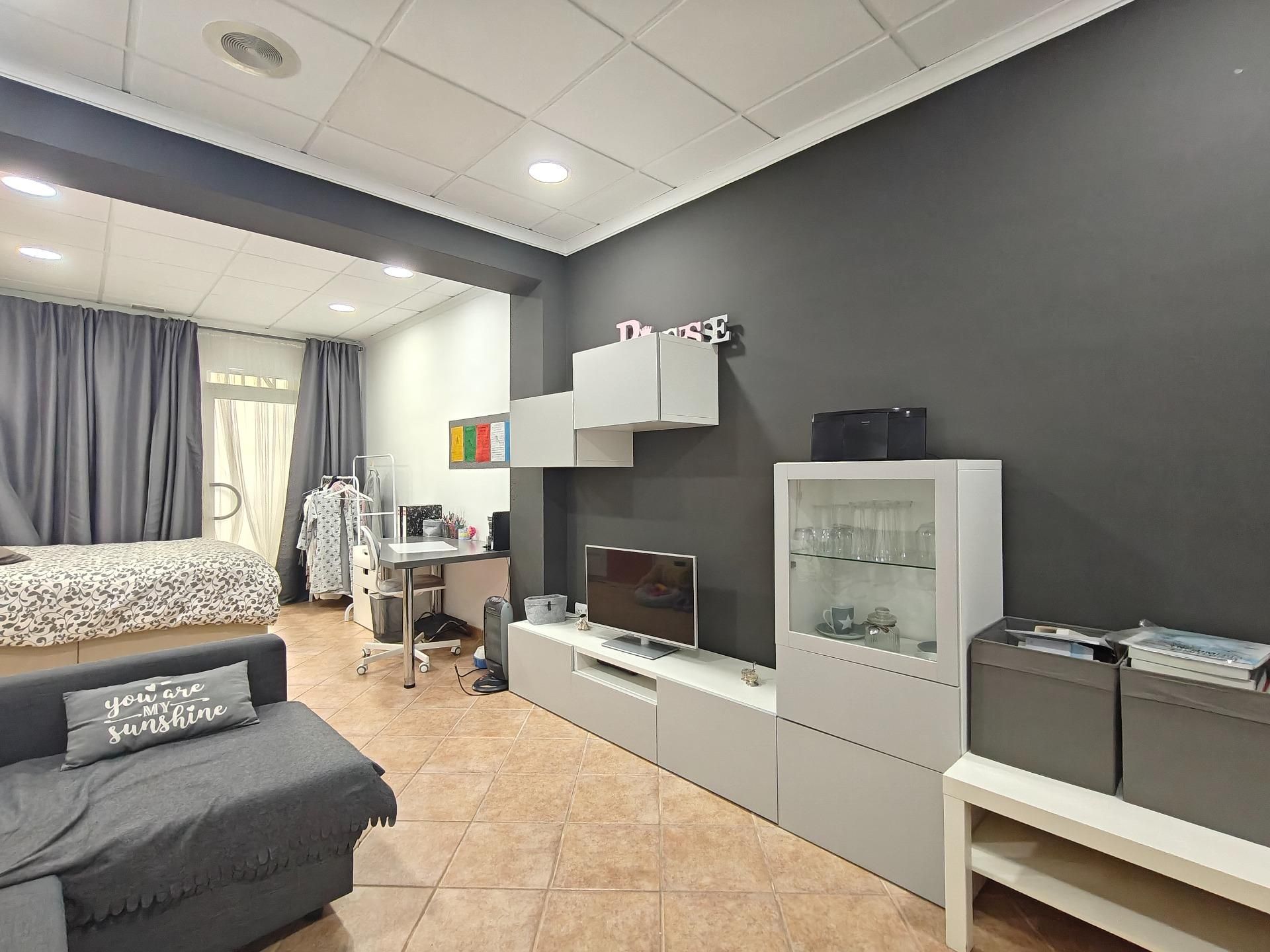 Sala de estar de Casa adosada en venta en Carcaixent con Aire acondicionado y Calefacción