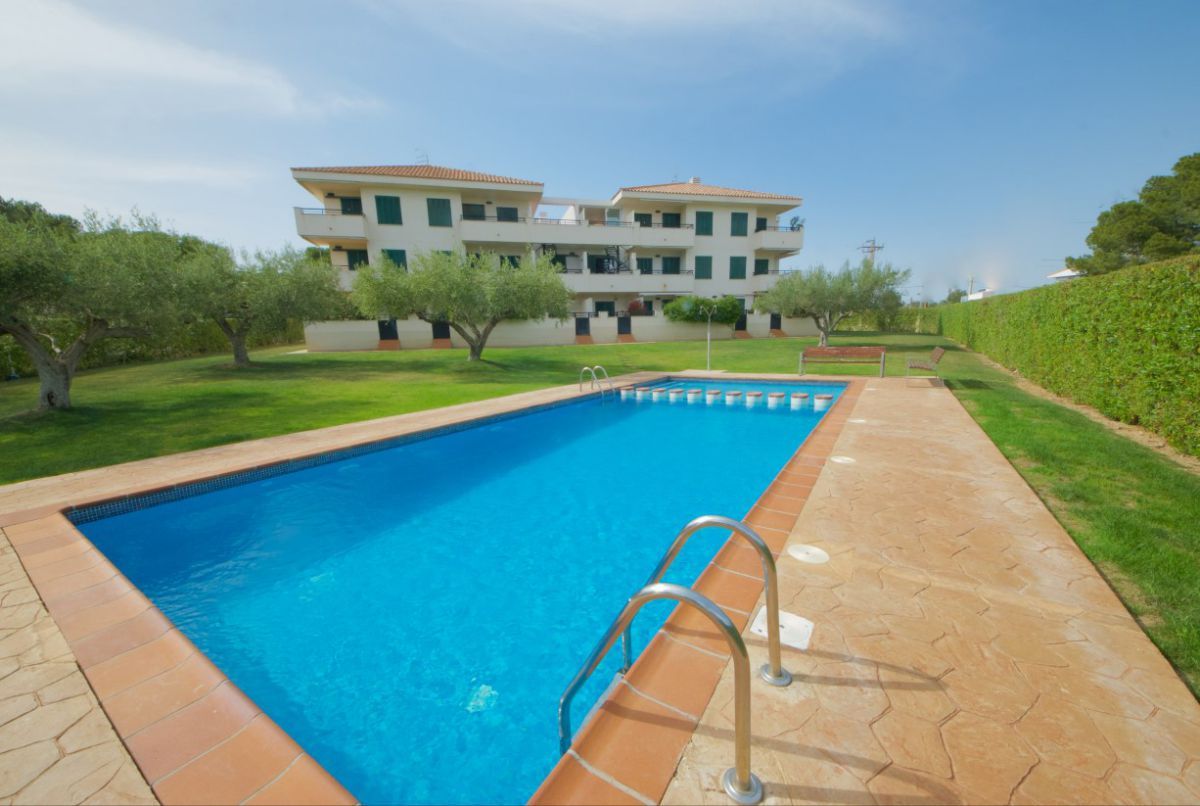 Swimming pool of Duplex for sale in L'Ampolla  with Air Conditioner, Terrace and Balcony