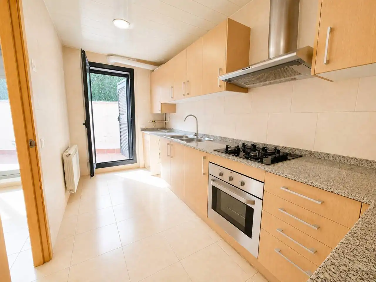 Küche von Wohnung zum Verkauf in Palafrugell mit Privatgarten, Terrasse und Gemeinschaftspool