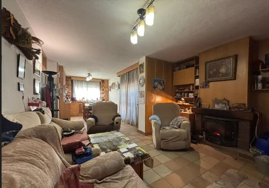 Sala d'estar de Casa adosada en venda en Rivas-Vaciamadrid amb Calefacció, Jardí privat i Parquet