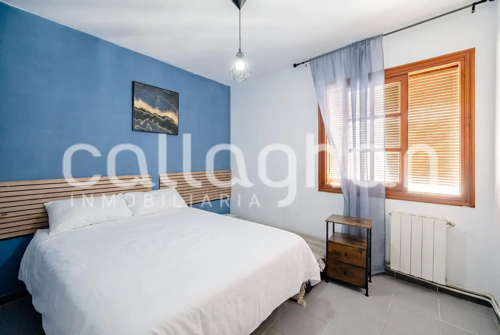 Dormitori de Casa adosada en venda en Sagunto / Sagunt amb Aire condicionat, Calefacció i Jardí privat