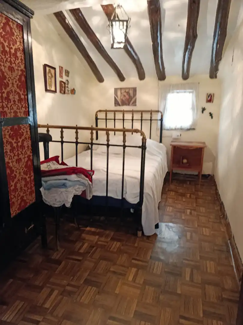 Habitación de Casa adosada en venta en Munilla con Trastero, Amueblado y Balcón