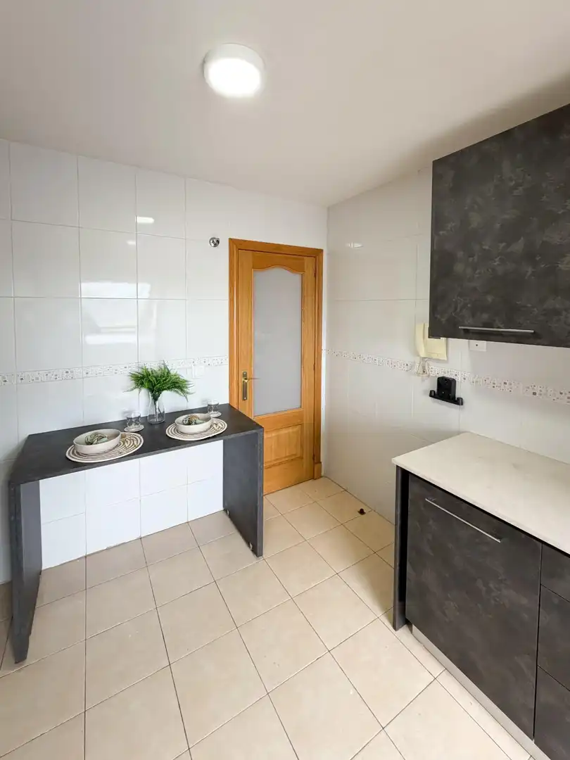 Kitchen of Attic for sale in Oviedo   with Heating, Parquet flooring and Storage room