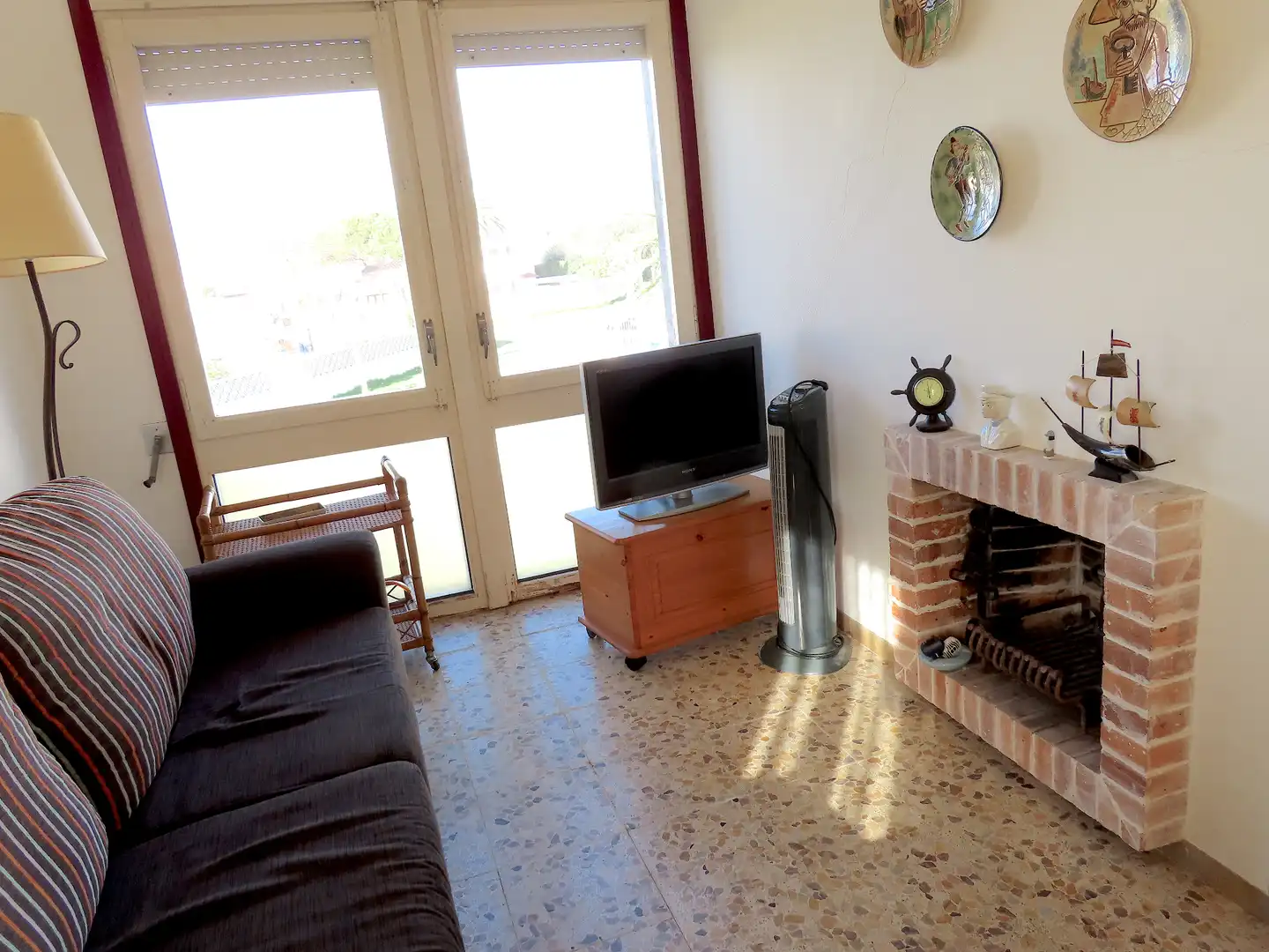 Sala de estar de Piso en venta en Empuriabrava con Jardín privado, Terraza y Amueblado