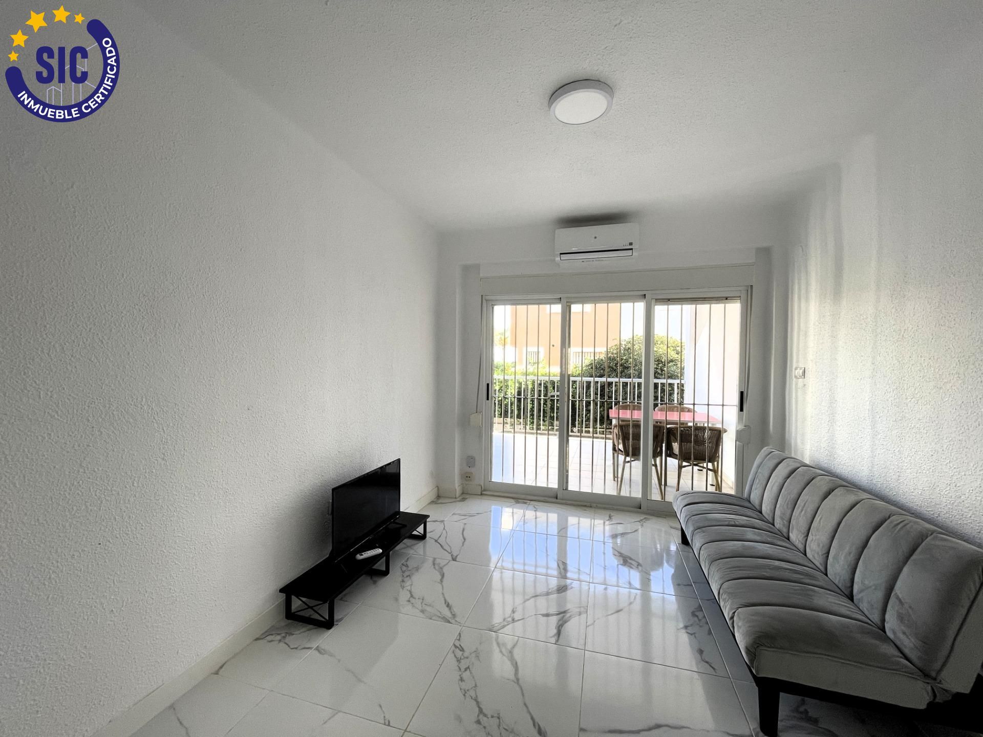 Sala d'estar de Apartament en venda en Oropesa del Mar / Orpesa amb Aire condicionat, Terrassa i Moblat