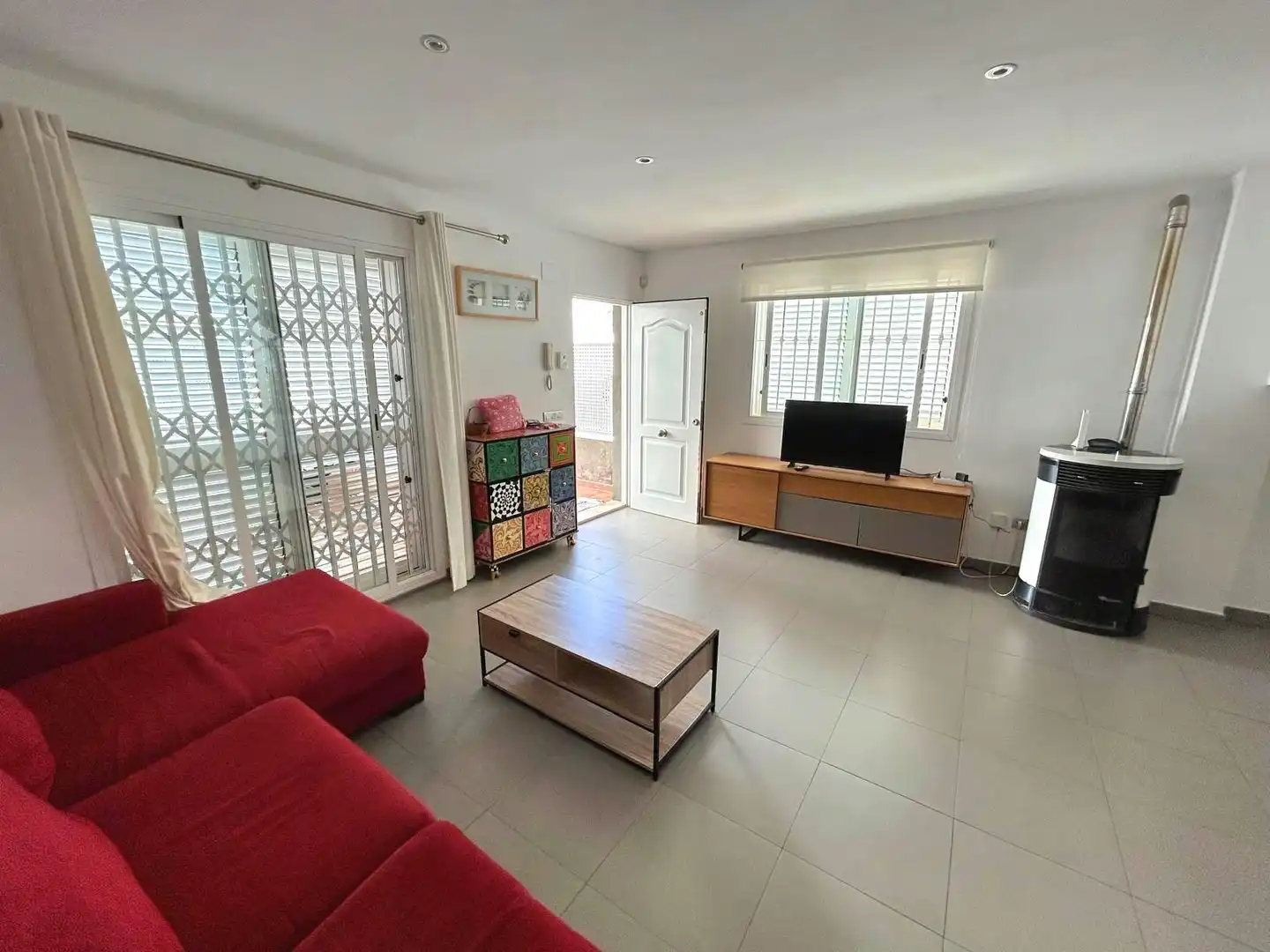 Sala de estar de Casa adosada en venta en Moncofa con Aire acondicionado, Terraza y Amueblado