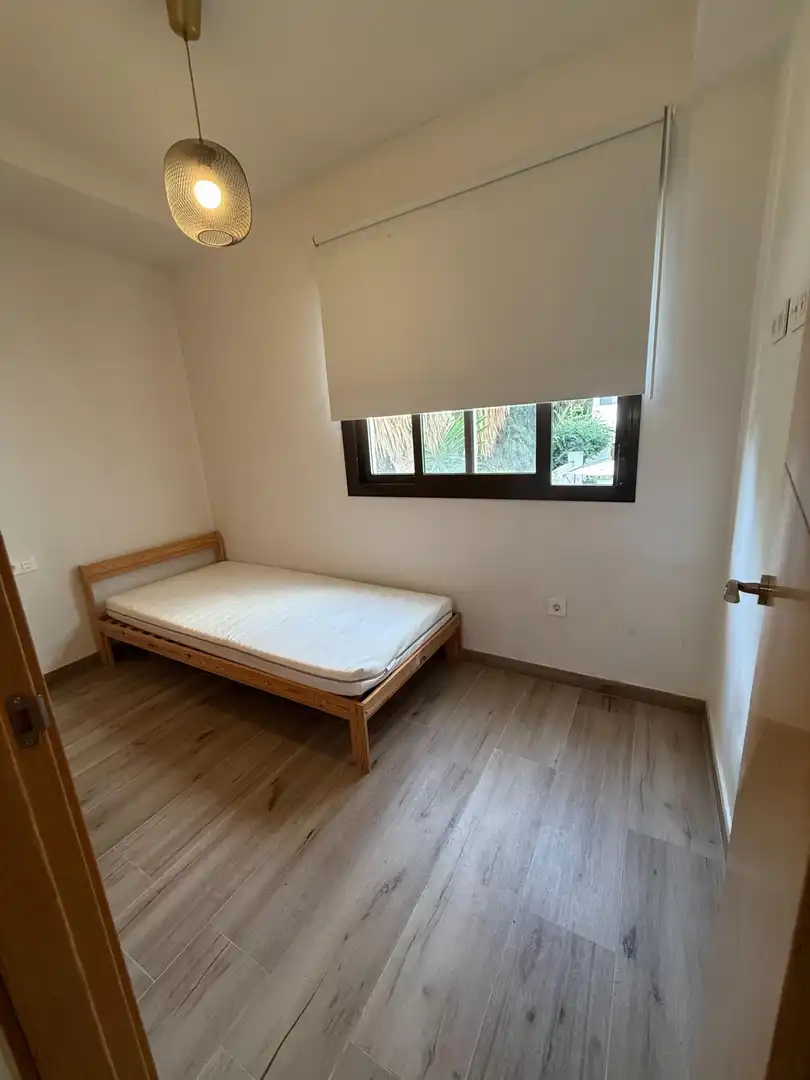 Dormitori de Apartament de lloguer en Málaga amb Aire condicionat, Terrassa i Moblat