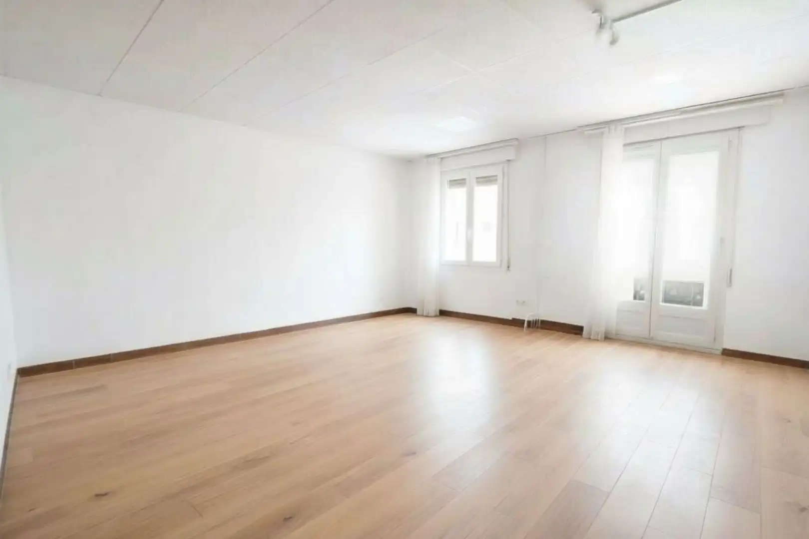 Sala de estar de Casa adosada en venta en Barcelona con Aire acondicionado y Terraza