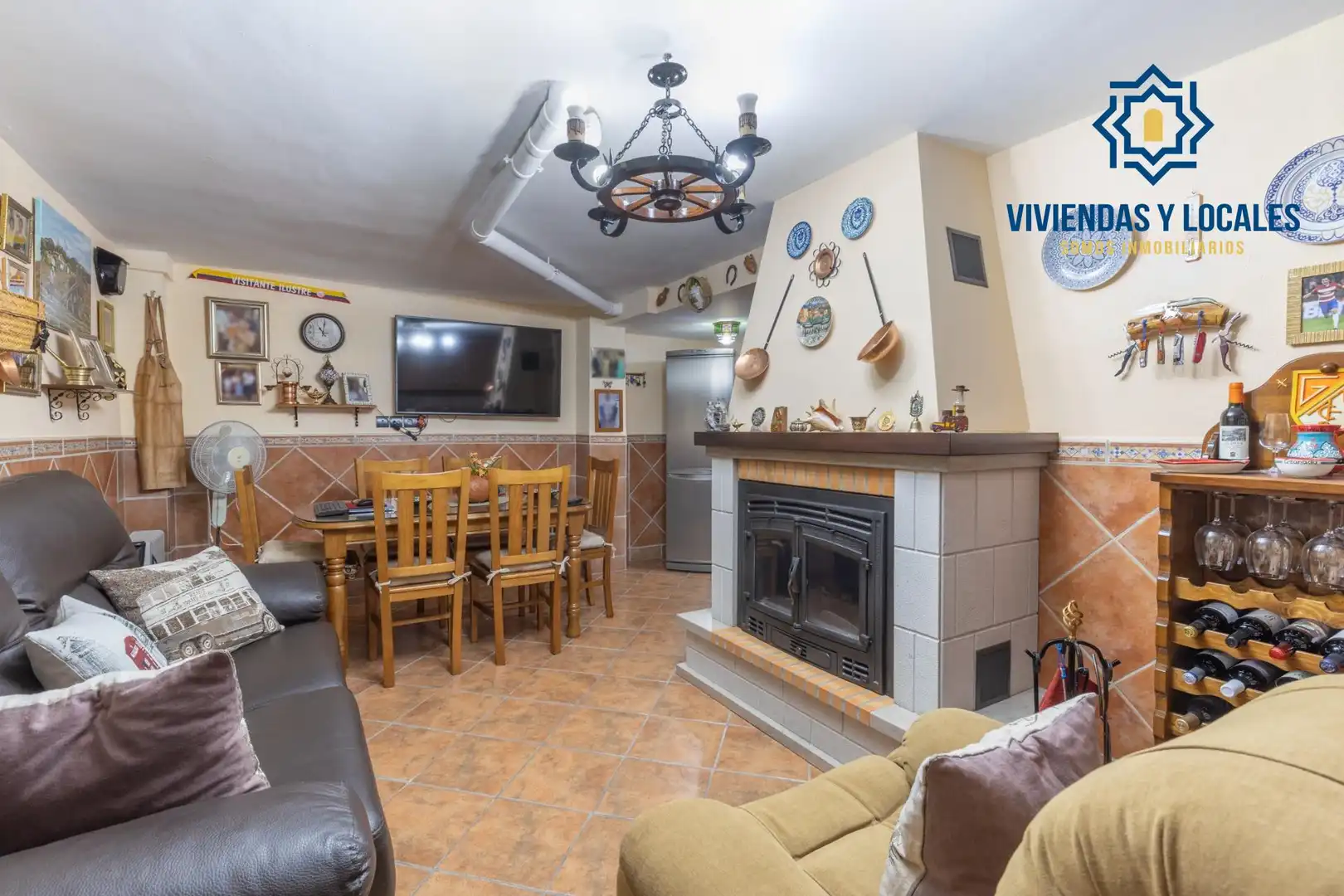 Sala d'estar de Casa adosada en venda en Armilla amb Calefacció