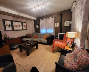 Sala d'estar de Casa adosada en venda en Ador amb Aire condicionat i Piscina
