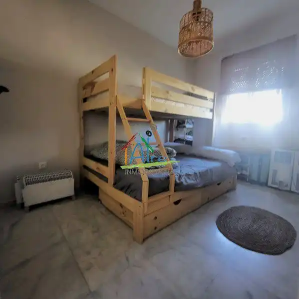 Habitación de Casa adosada en venta en Almonte con Aire acondicionado, Calefacción y Jardín privado