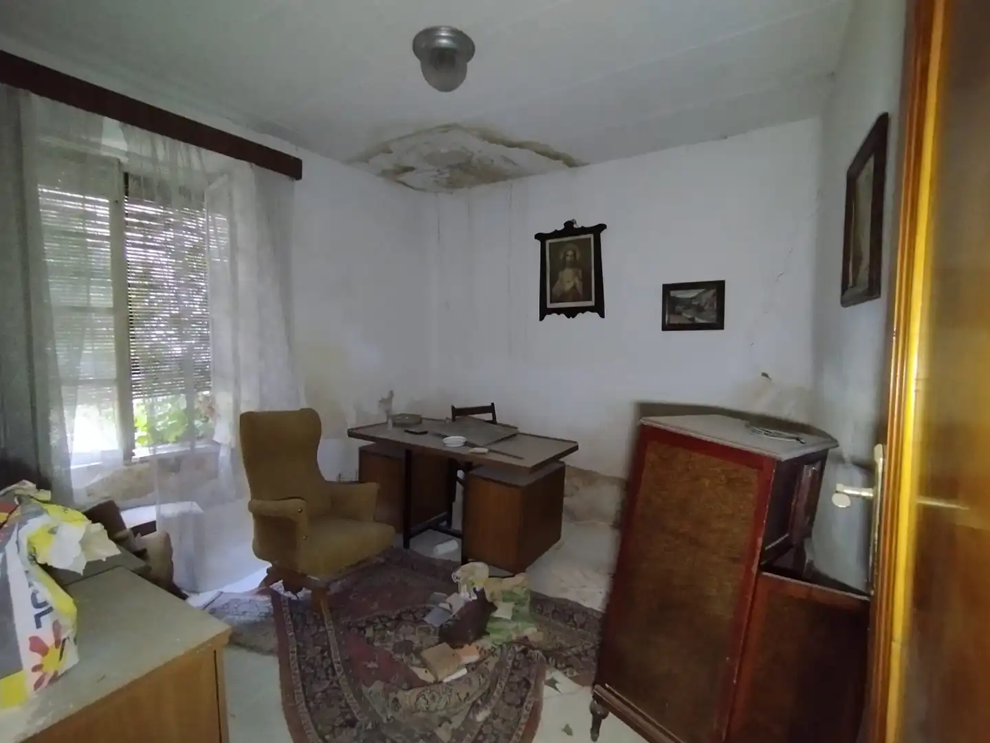 Sala d'estar de Casa adosada en venda en Tomelloso