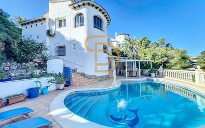 Vista exterior de Casa o xalet en venda en Pedreguer amb Aire condicionat, Terrassa i Piscina