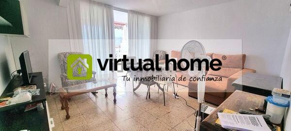 Sala d'estar de Apartament en venda en Benidorm amb Jardí privat, Terrassa i Piscina comunitària