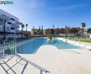 Swimming pool of Planta baja for sale in Salobreña  with Air Conditioner, Heating and Terrace