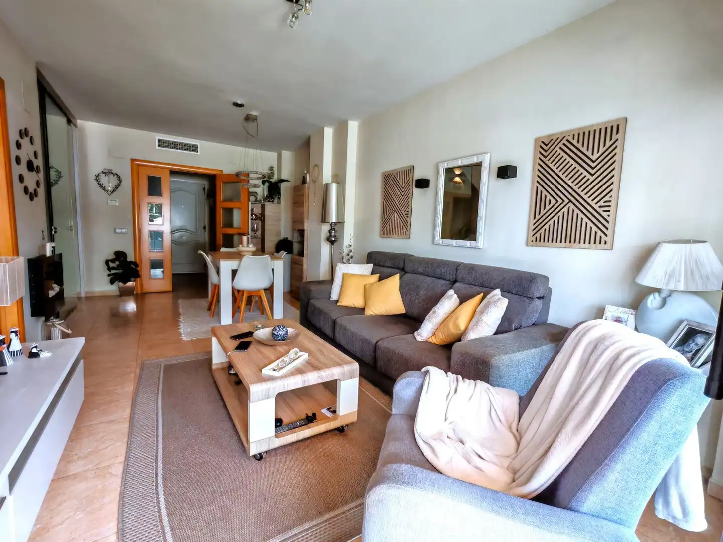Sala de estar de Casa adosada en venta en El Vendrell con Aire acondicionado, Calefacción y Jardín privado
