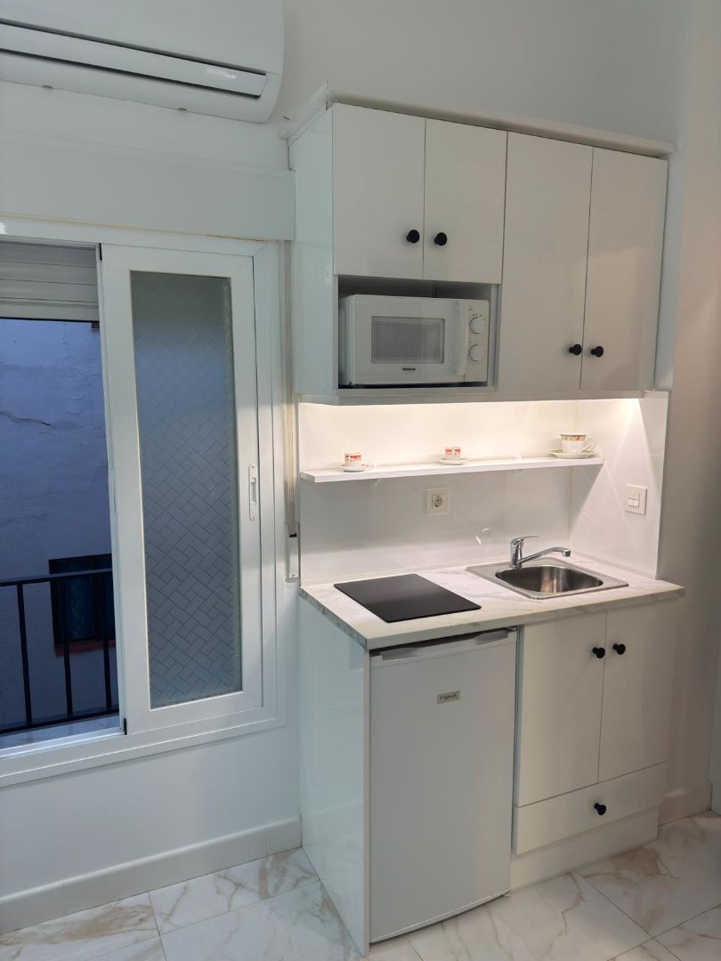Kitchen of Study to rent in  Granada Capital  with Air Conditioner, Furnished and Washing machine