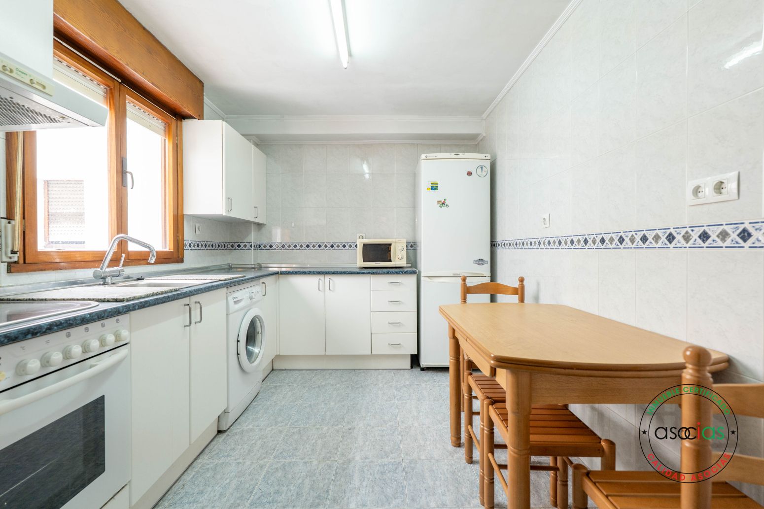 Kitchen of Flat for sale in Oviedo   with Heating, Parquet flooring and Storage room
