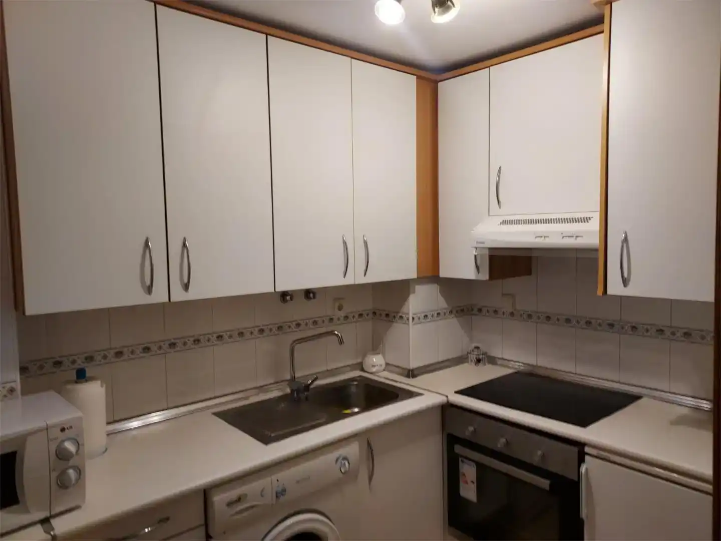 Cuina de Apartament de lloguer en Orihuela amb Aire condicionat, Piscina i Balcó
