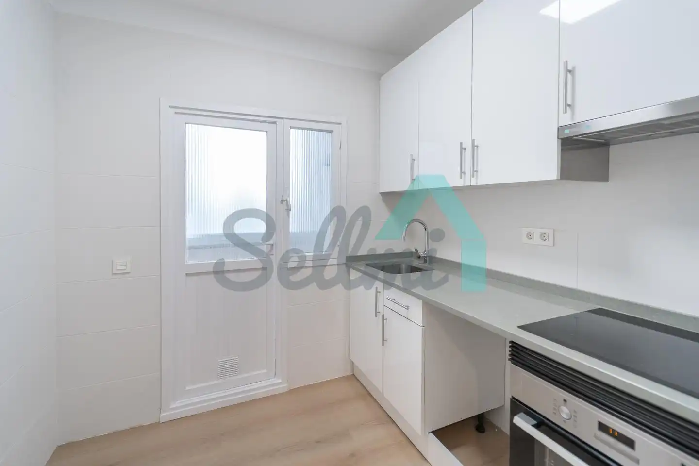 Kitchen of Flat for sale in Oviedo   with Heating, Parquet flooring and Storage room
