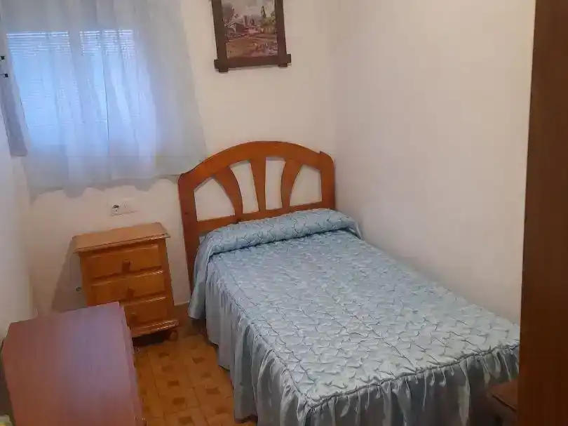 Dormitori de Casa adosada de lloguer en Alcántara amb Aire condicionat i Moblat