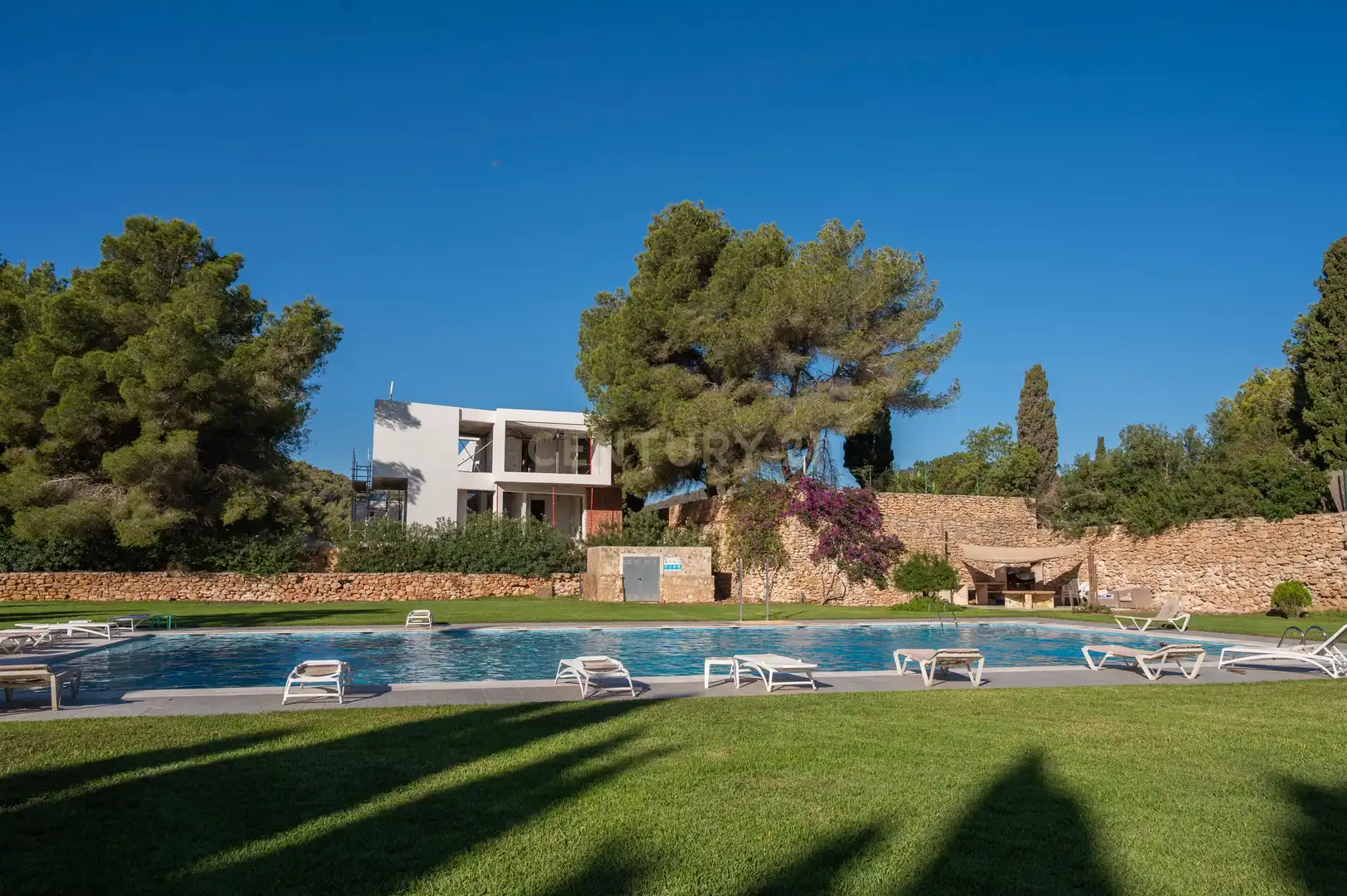 Piscina de Apartamento de alquiler en Santa Eulària des Riu con Aire acondicionado, Jardín privado y Piscina comunitaria