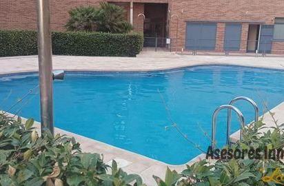 Swimming pool of Attic for sale in  Madrid Capital  with Air Conditioner, Heating and Parquet flooring